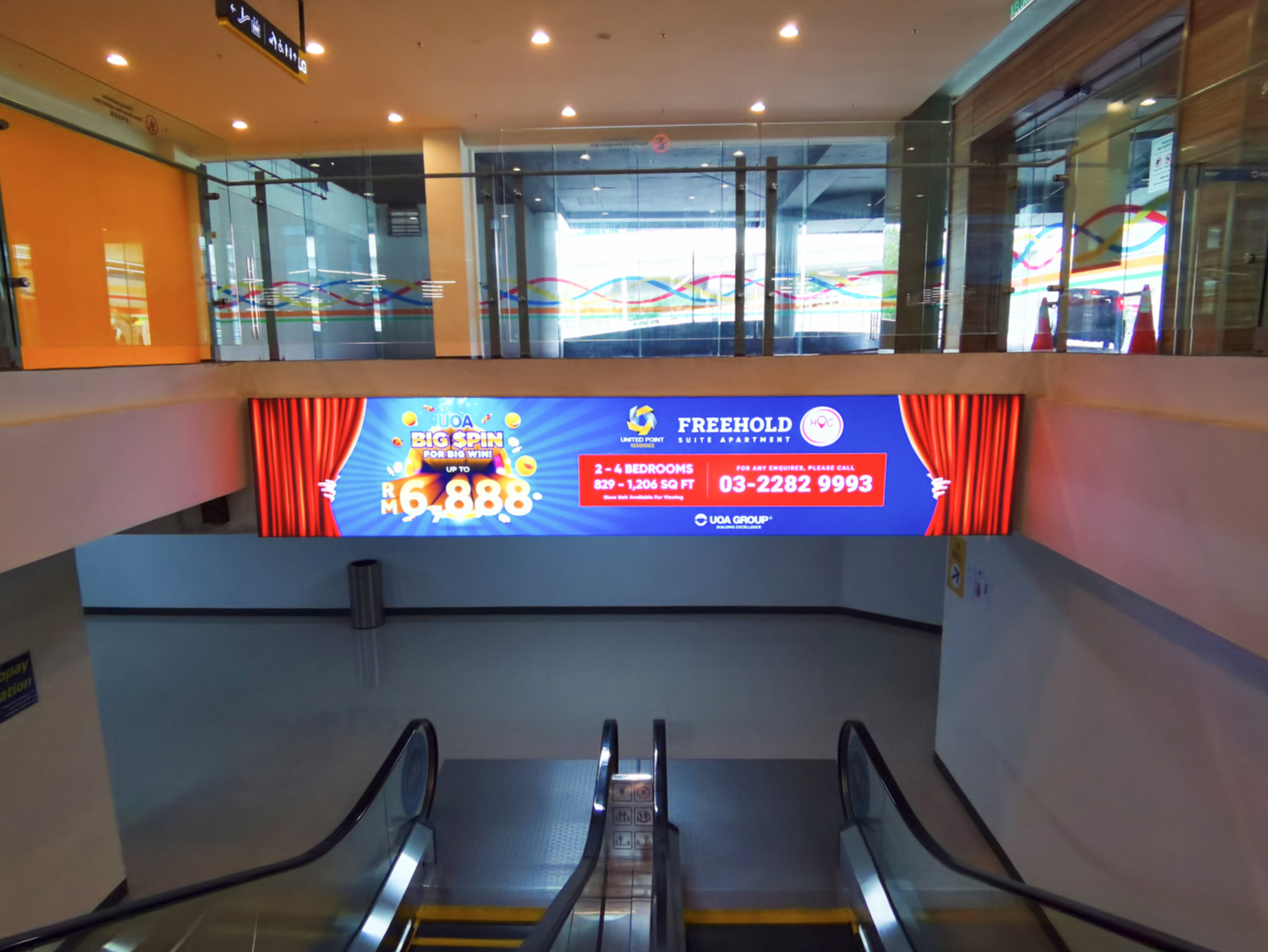 Escalator Light box Sign at United Point